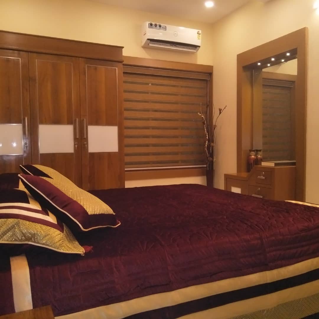 BUILD ARK INTERIORS AND BUILDERS THALASSERY